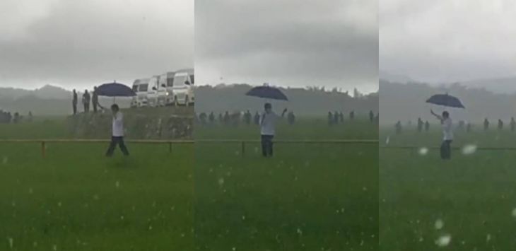 Viral Video Jokowi Terobos Hujan di Tengah Sawah Sendirian